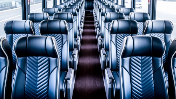 south gate 54 passenger charter bus inside